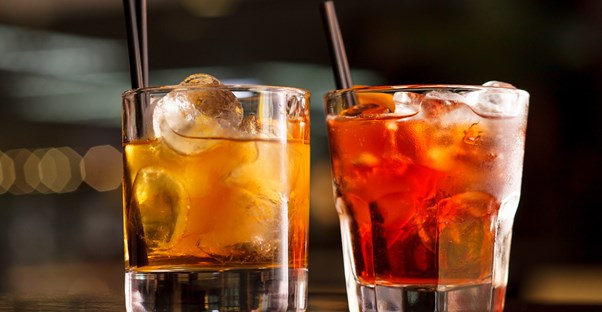Drinks being made in a small bar space