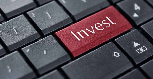 Keyboard key that says invest