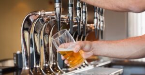 Drinks being poured at a home bar