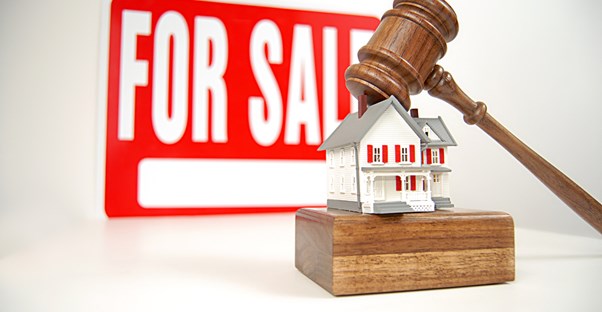 For Sale Sign and gavel