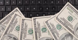 Benjamins on a keyboard