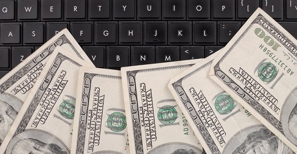 Benjamins on a keyboard