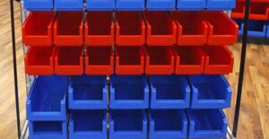 Small storage shelf for holding smaller athletic equipment