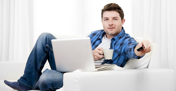 Man checking to see if his smart tv was hacked