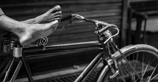 black and white photo of a bike