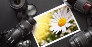 a camera and extra gadgets purchased for it on a table