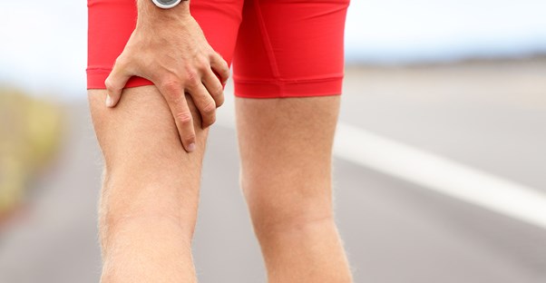 a runner grabs where he feels leg pain