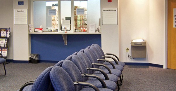 An empty waiting room in a doctor's office.
