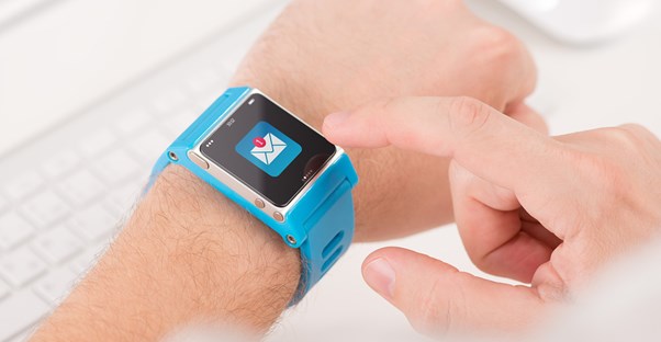 a man using a smart watch