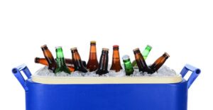 A cooler filled with ice and beer
