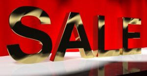 a sale sign shows the way to discounted branson show tickets