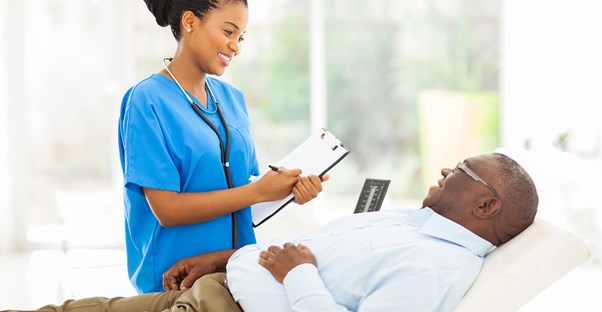A nurse talks to a patient