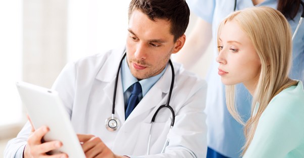 Doctor speaks with a patient