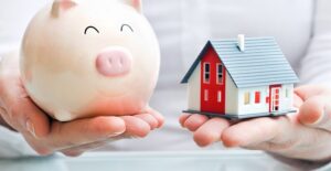 A woman balances out her budget with her home needs