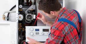 A man contemplating disadvantages of his new tankless water heater.