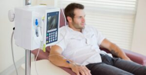 a man experiencing chemotherapy side effects