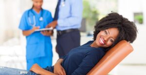 a woman preparing for her first pap smear