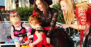 A family dressed in Halloween costumes