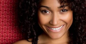a woman who uses shampoo for black hair