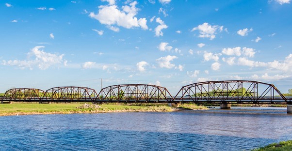 a bridge crosses a river along the oklahoma portion of route 66