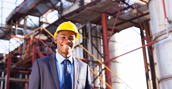 A chemical engineer smiles for the camera