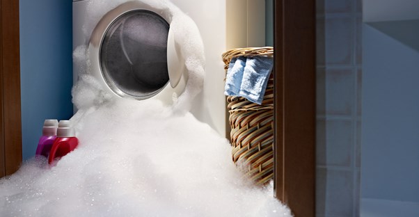 A malfunctioning washing machine that needs to be repaired