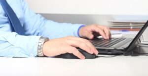 Man works on his laptop