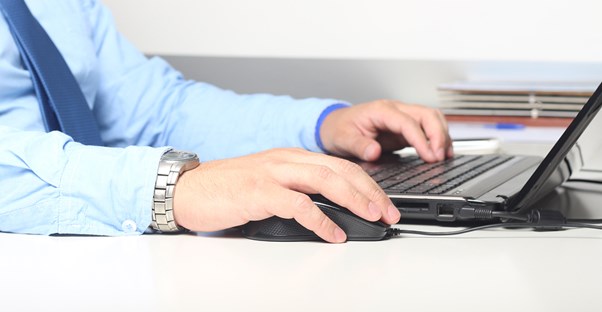 Man works on his laptop