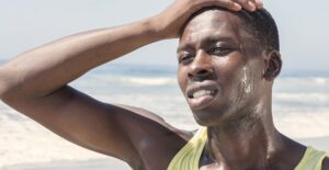 a man who is sweating from hyperhidrosis