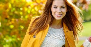 Woman modeling her new fall coat