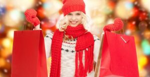 Woman smiling because she stuck to her holiday budget