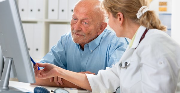 a doctor explaining multiple myeloma to a patient
