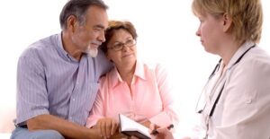 a doctor explaining multiple myeloma risk factors