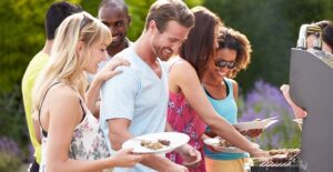 A group of friends enjoying the perfect cookout party.