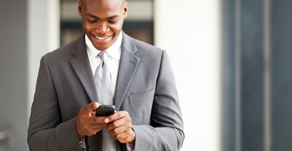 Man Using His Smartphone for business use