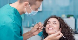 a woman who knows the pros and cons of dental implants