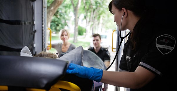 EMTs and paramedics work together
