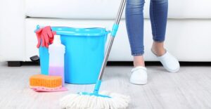 a mother who is cleaning to prevent a child asthma attack