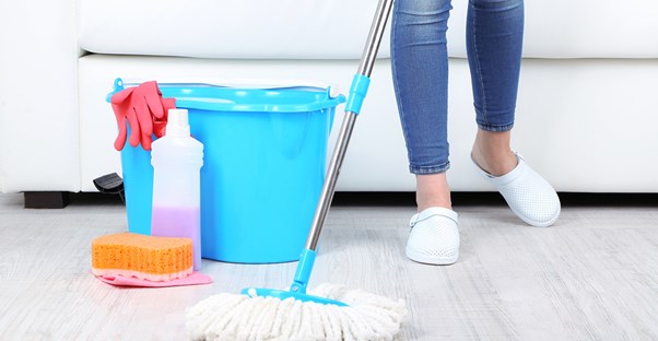 a mother who is cleaning to prevent a child asthma attack