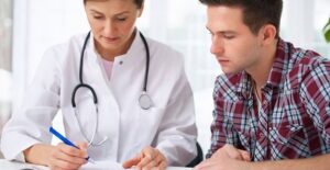 a doctor explaining the risks of a colonoscopy