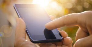 Man uses his newly purchased cell phone
