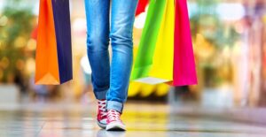 Woman walking around on Black Friday wishing she had stayed home