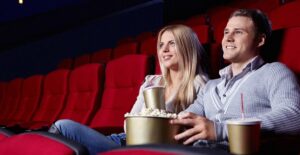 A couple watching the new hunger games movie