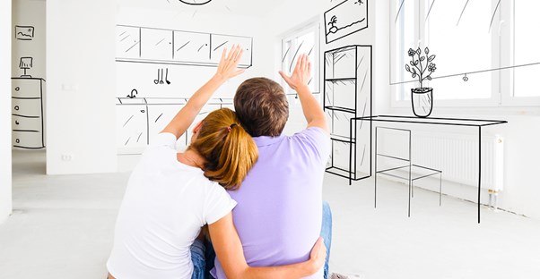 Couple planning the layout of their new apartment