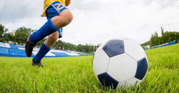a kid who would be treated with a sports first aid kit