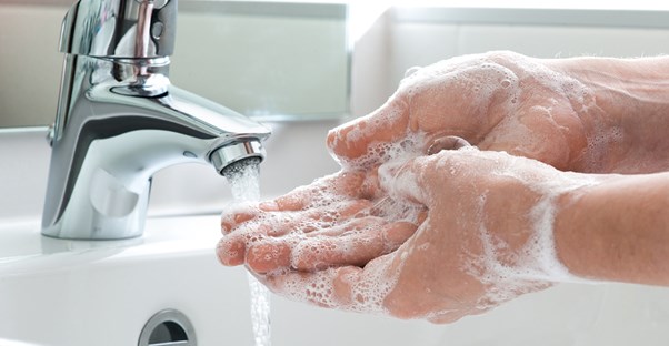 a woman who is preventing the common cold