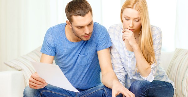 A couple goes over paperwork together