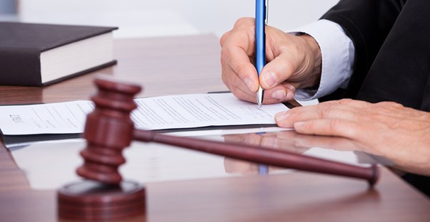 Client signing a mediation settlement agreement