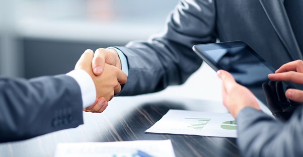 Mediator successfully resolving a case with a settlement agreement