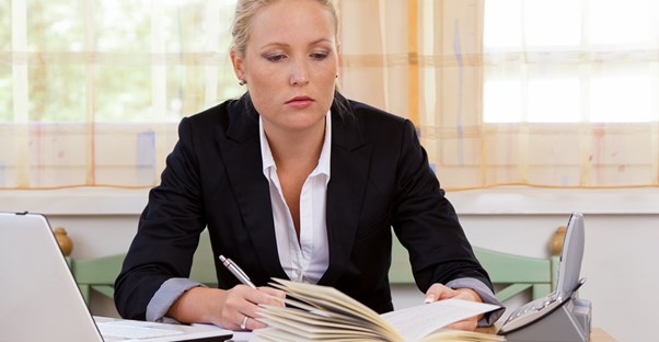 A tax attorney does some paper work
